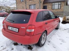 Фото авто Mazda 323