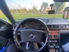 Сүрөт унаа Mercedes-Benz W124