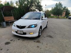 Сүрөт унаа Mazda Demio