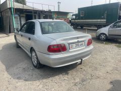 Сүрөт унаа Mitsubishi Carisma