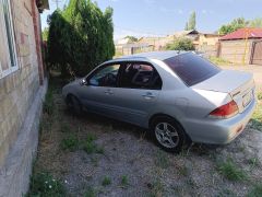 Фото авто Mitsubishi Lancer