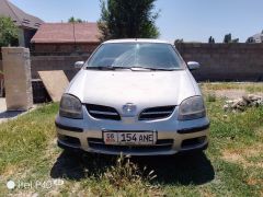 Photo of the vehicle Nissan Almera Tino