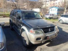 Сүрөт унаа Mitsubishi Montero Sport