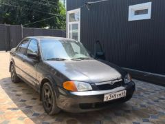 Сүрөт унаа Mazda Protege