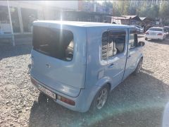 Фото авто Nissan Cube