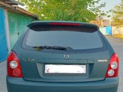 Сүрөт унаа Mazda 323