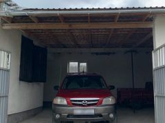 Сүрөт унаа Mazda Tribute