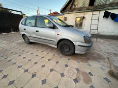 Фото авто Nissan Almera Tino