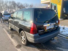 Photo of the vehicle Mazda Tribute