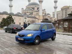 Фото авто Mazda Demio