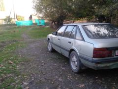 Фото авто Mazda 626