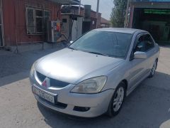 Фото авто Mitsubishi Lancer