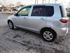 Photo of the vehicle Mazda Demio