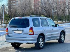 Photo of the vehicle Mazda Tribute