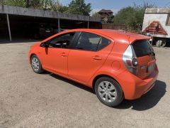 Фото авто Toyota Prius c