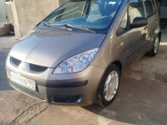 Photo of the vehicle Mitsubishi Colt