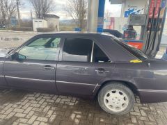 Сүрөт унаа Mercedes-Benz W124