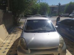 Сүрөт унаа Toyota Passo