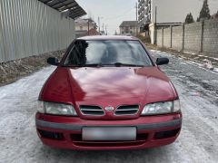 Photo of the vehicle Nissan Primera