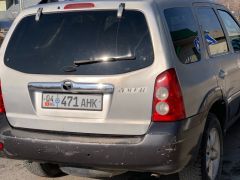 Photo of the vehicle Mazda Tribute