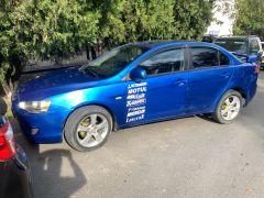 Сүрөт унаа Mitsubishi Lancer