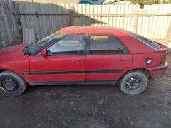 Фото авто Mazda 323