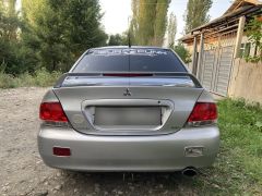 Фото авто Mitsubishi Lancer