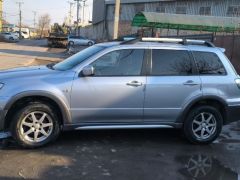 Сүрөт унаа Mitsubishi Outlander