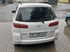 Photo of the vehicle Mazda Demio