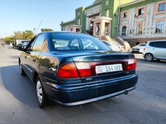 Сүрөт унаа Mazda 323