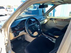 Сүрөт унаа Mercedes-Benz W124