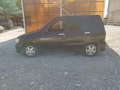 Сүрөт унаа Nissan Cube