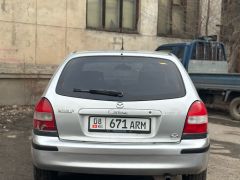 Фото авто Mazda 323