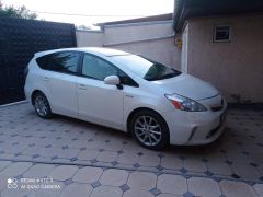 Фото авто Toyota Prius v (+)