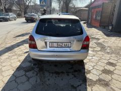 Фото авто Mazda 323