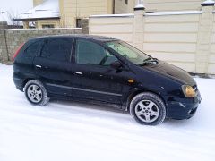 Photo of the vehicle Nissan Almera Tino