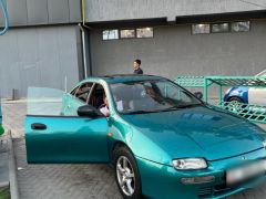 Photo of the vehicle Mazda 323