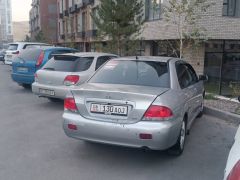 Фото авто Mitsubishi Lancer