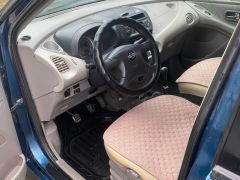 Photo of the vehicle Nissan Almera Tino