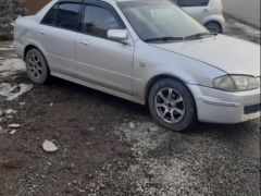 Фото авто Mazda 323