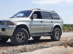 Сүрөт унаа Mitsubishi Montero Sport