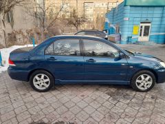 Сүрөт унаа Mitsubishi Lancer