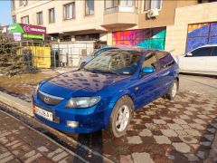 Фото авто Mazda 323