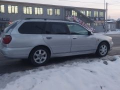 Фото авто Nissan Primera