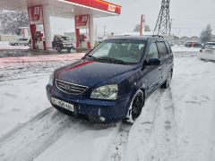 Фото авто Kia Carens