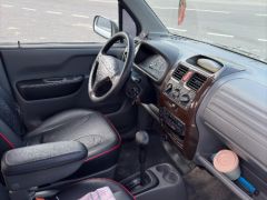 Сүрөт унаа Suzuki Wagon R+