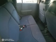 Сүрөт унаа Nissan Cube