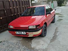 Сүрөт унаа Mazda 323