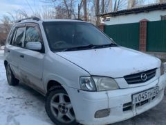 Photo of the vehicle Mazda Demio