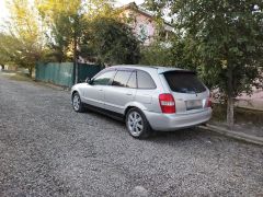 Фото авто Mazda Familia